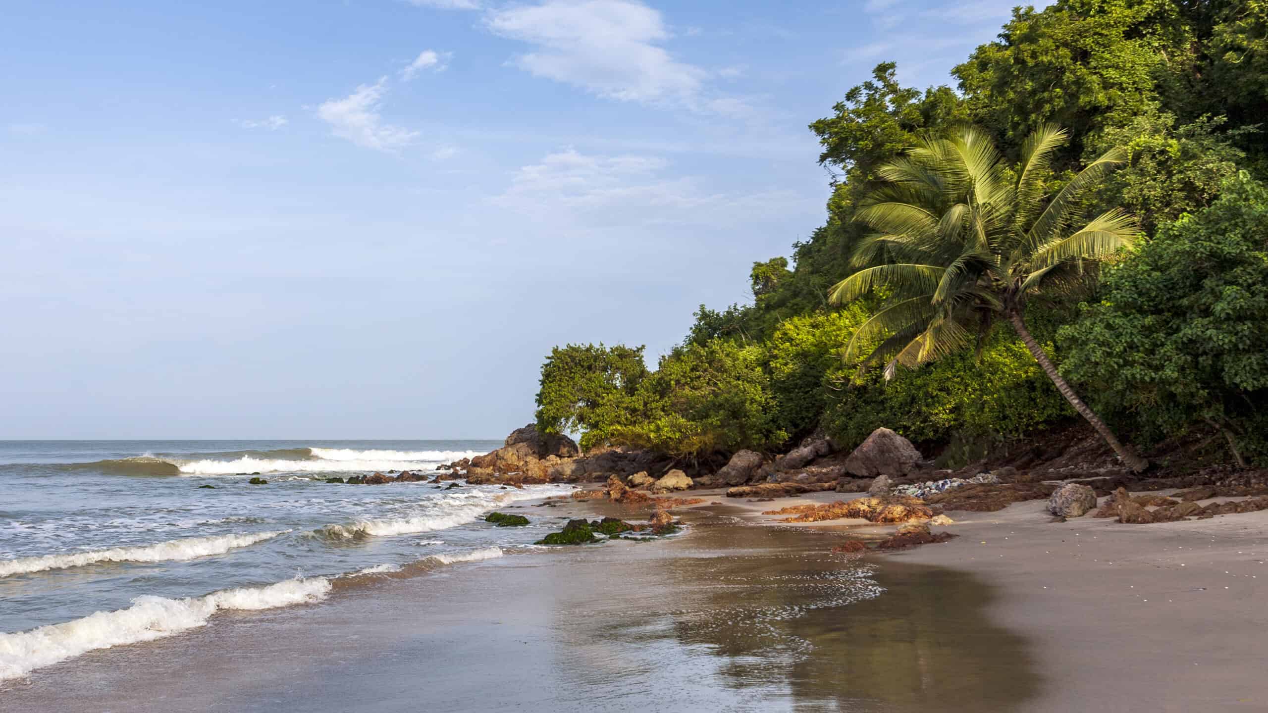 Ghana, Central, waves in the Atlantic Ocean on a tropical beach in West Africa