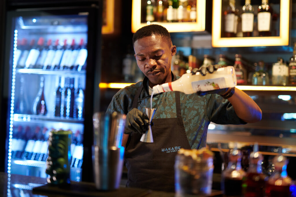Bartender pouring a drink