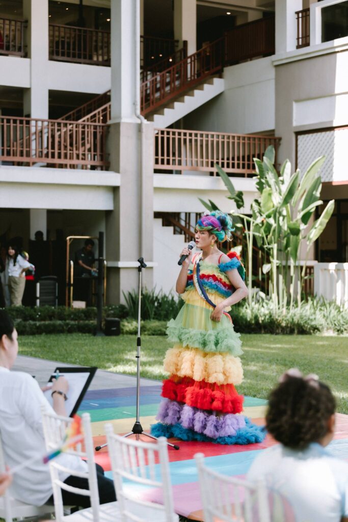 A PWD Marriott associate participating in a beauty pageant contest held by his hotel during Pride Month.