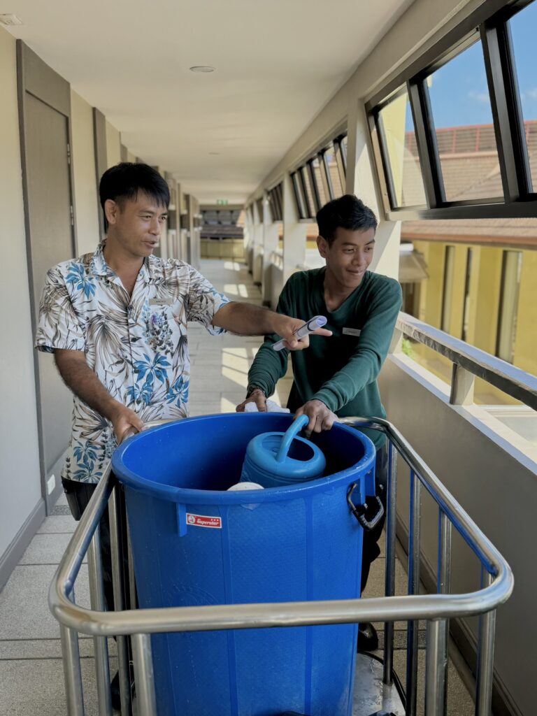 A supervisor working alongside an associate with disability